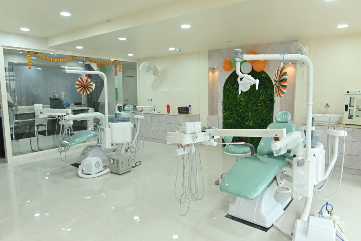 The Care32 treatment floor in Kukatpally, with multiple dental chairs and a glass-walled consultation room